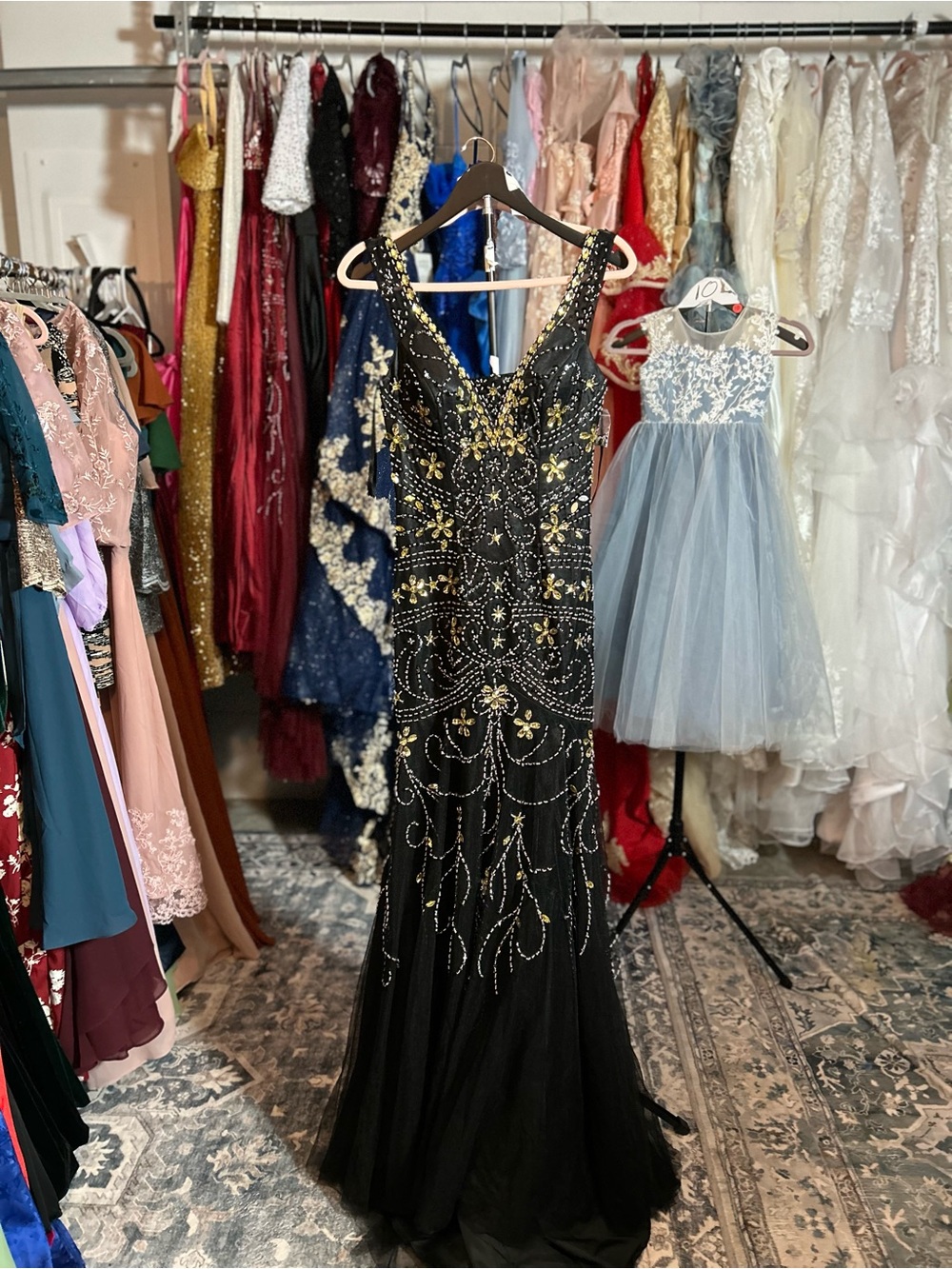 Elegant Black Beaded Evening Gown with Gold Accents